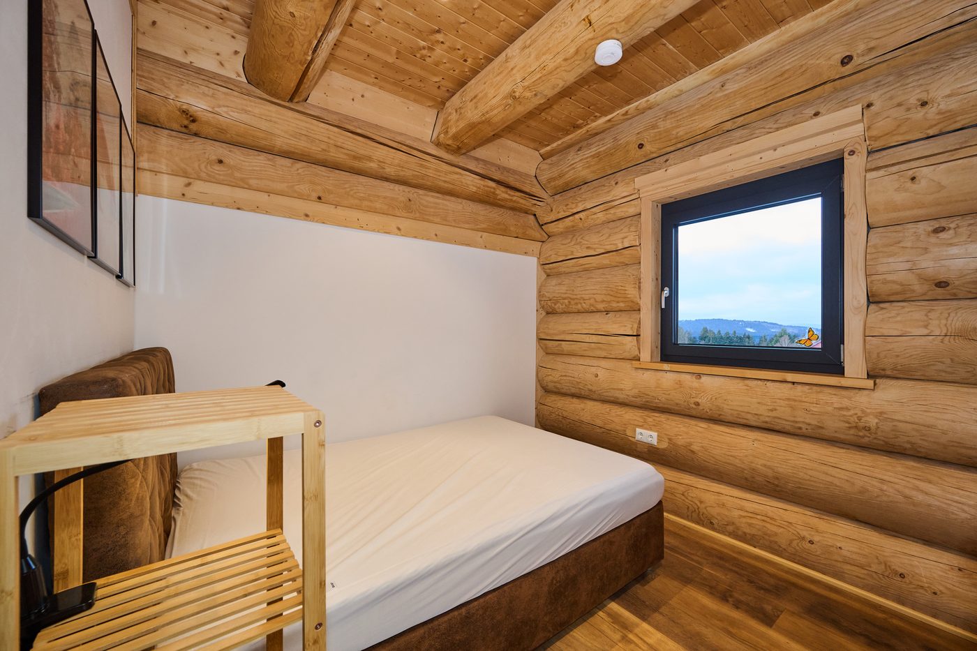 Drittes Schlafzimmer mit Einzelbett im WoidSinn Chalet